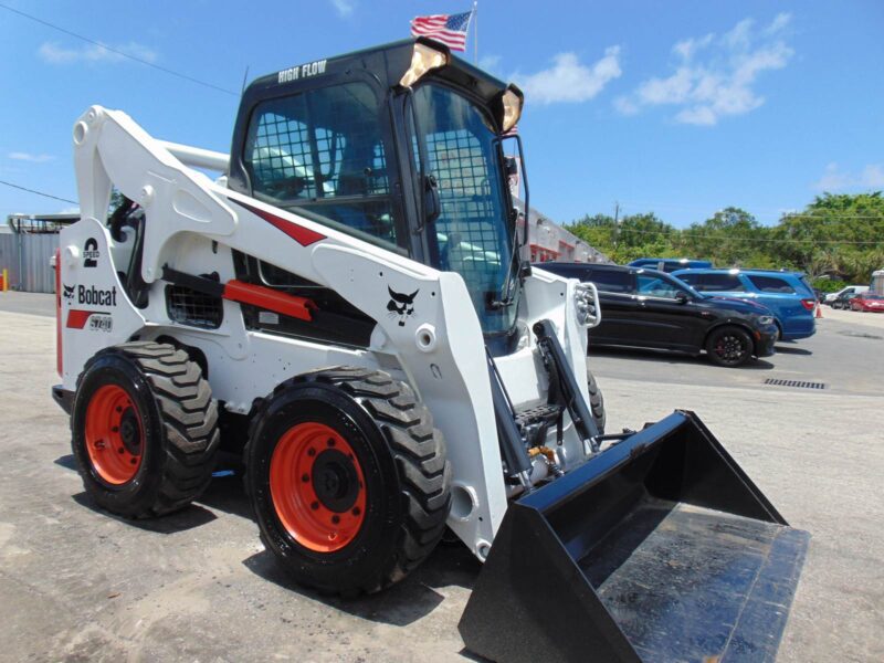 2017 BOBCAT S-740 TURBO 2 SPEED "HIGH FLOW" - JOYSTICKS - HEAT & A/C - STEREO - MONITOR - KEYLESS SECURITY - BRAND NEW TIRES - 100% SERVICED