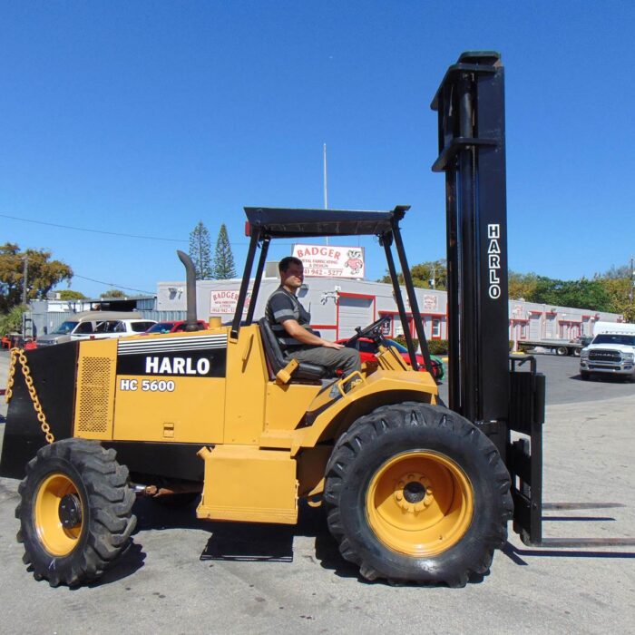 2002 2001 HARLO HC5600 ROUGH TERRAIN 4WD TRIPLE MAST FORKLIFT - 5,000 POUNDS - 28 FT HEIGHT - SIDE SHIFTER - CUMMINS DIESEL - SERVICED AND JOB READY