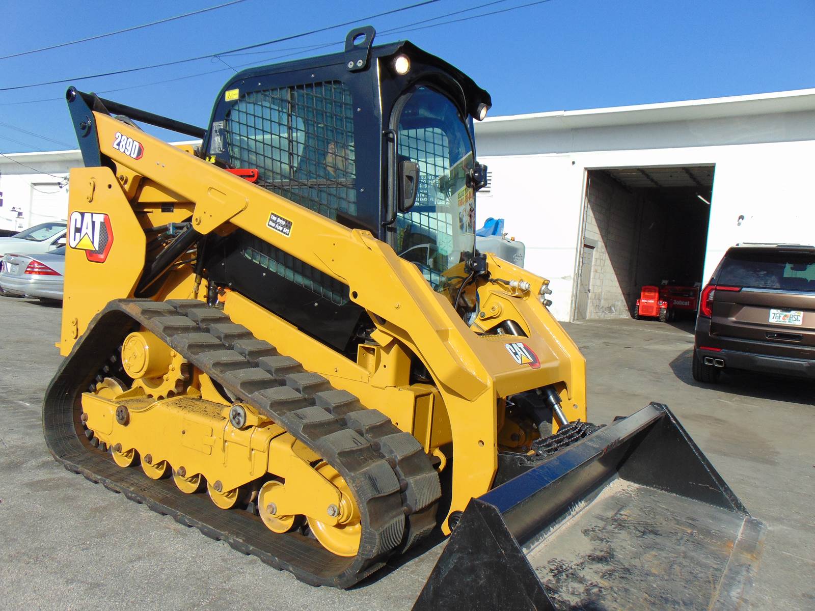 2015 CAT 289D TURBO 2 SPEED - PRE EMISSIONS DIESEL - SUPER LOADED - HEAT - AC - JOYSTICKS - AIR RIDE - BRAND NEW TRACKS - 1,932 HOURS