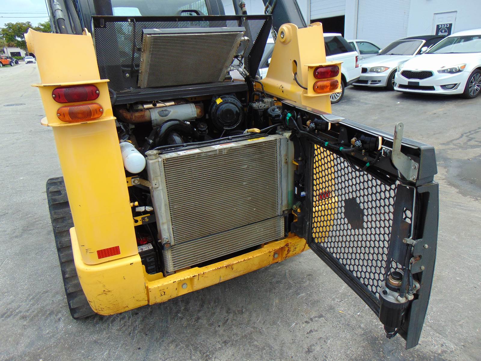 2016 NEW HOLLAND C227 TURBO 2 SPEED "BIG 74 HP" PRE EMISSIONS - HEAT - AC - STEREO - POWER COUPLER - JOYSTICKS - LOW HOURS - AIR RIDE - 100% JOB READY - Image 8
