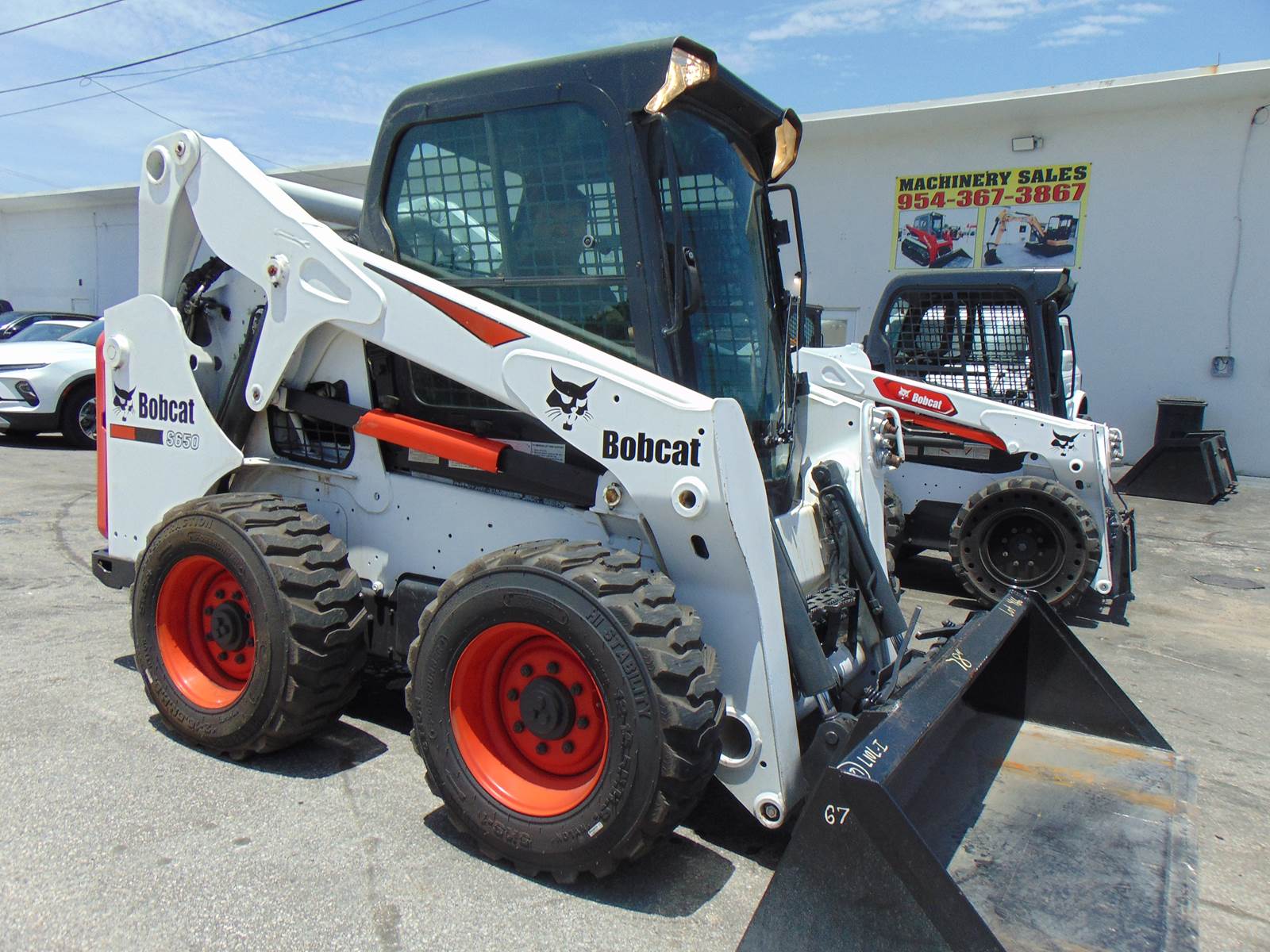 2019 BOBCAT S650 TURBO 2 SPEED - BOB TACH - STEREO - HEAT AND A/C - NEW TIRES - ONLY 1,797 HOURS - 100% JOB READY
